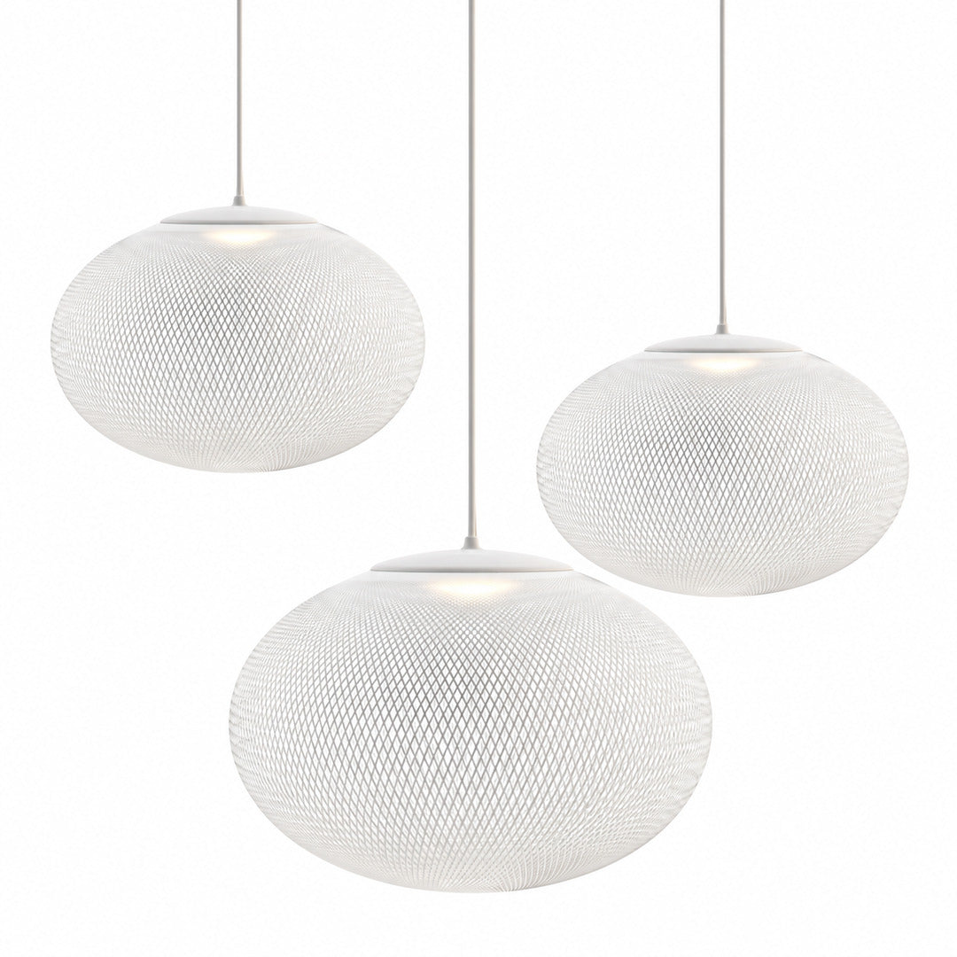 Three-head cluster of Reticella mesh pendant lights over a long dining table