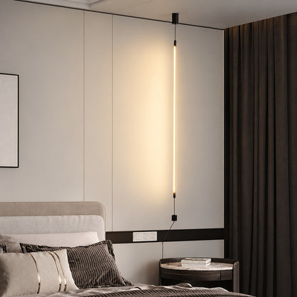 Riga floor to ceiling lamps beside the bed in a modern boutique hotel room