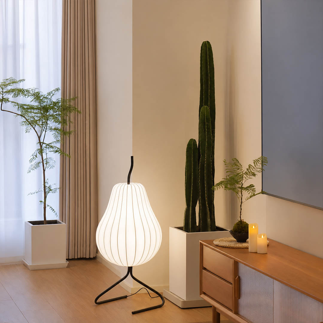 Rina silk pear table-height floor lamp Scandinavian living room corner white oak linen minimalist warm ambient soft glow lifestyle interior