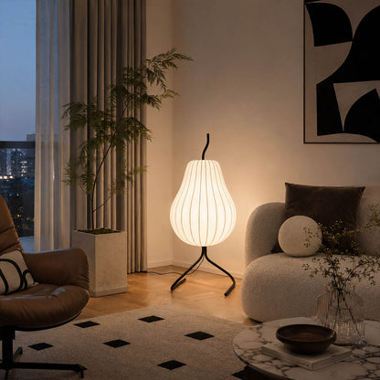 Rina silk pear floor lamp illuminated warm 2700K glow evening atmospheric silk shade translucent soft ambient serene detail close up bedside