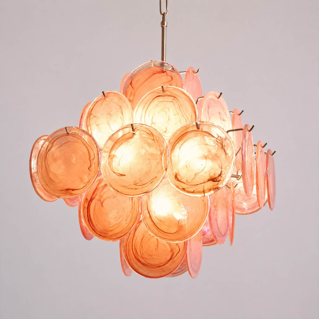 Rosalia illuminated pink iridescent Murano glass discs warm 2700K romantic glow evening atmosphere mesmerizing shimmer luminous detail close up