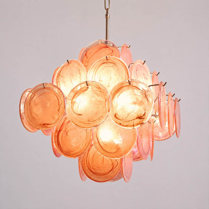 Rosalia illuminated pink iridescent Murano glass discs warm 2700K romantic glow evening atmosphere mesmerizing shimmer luminous detail close up