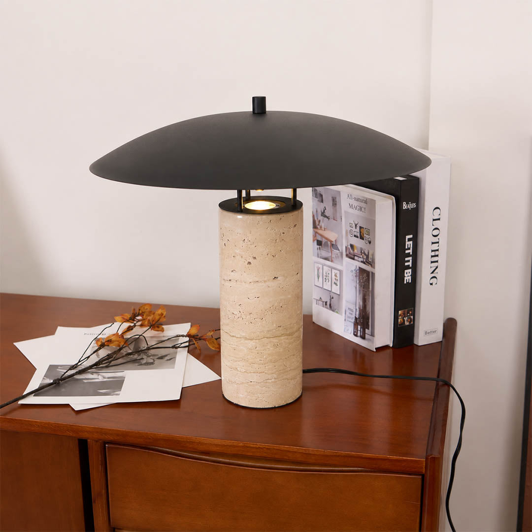 Sabbia travertine table lamp modern entryway console illuminated travertine black shade warm natural American home lifestyle interior