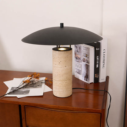 Sabbia travertine table lamp modern entryway console illuminated travertine black shade warm natural American home lifestyle interior