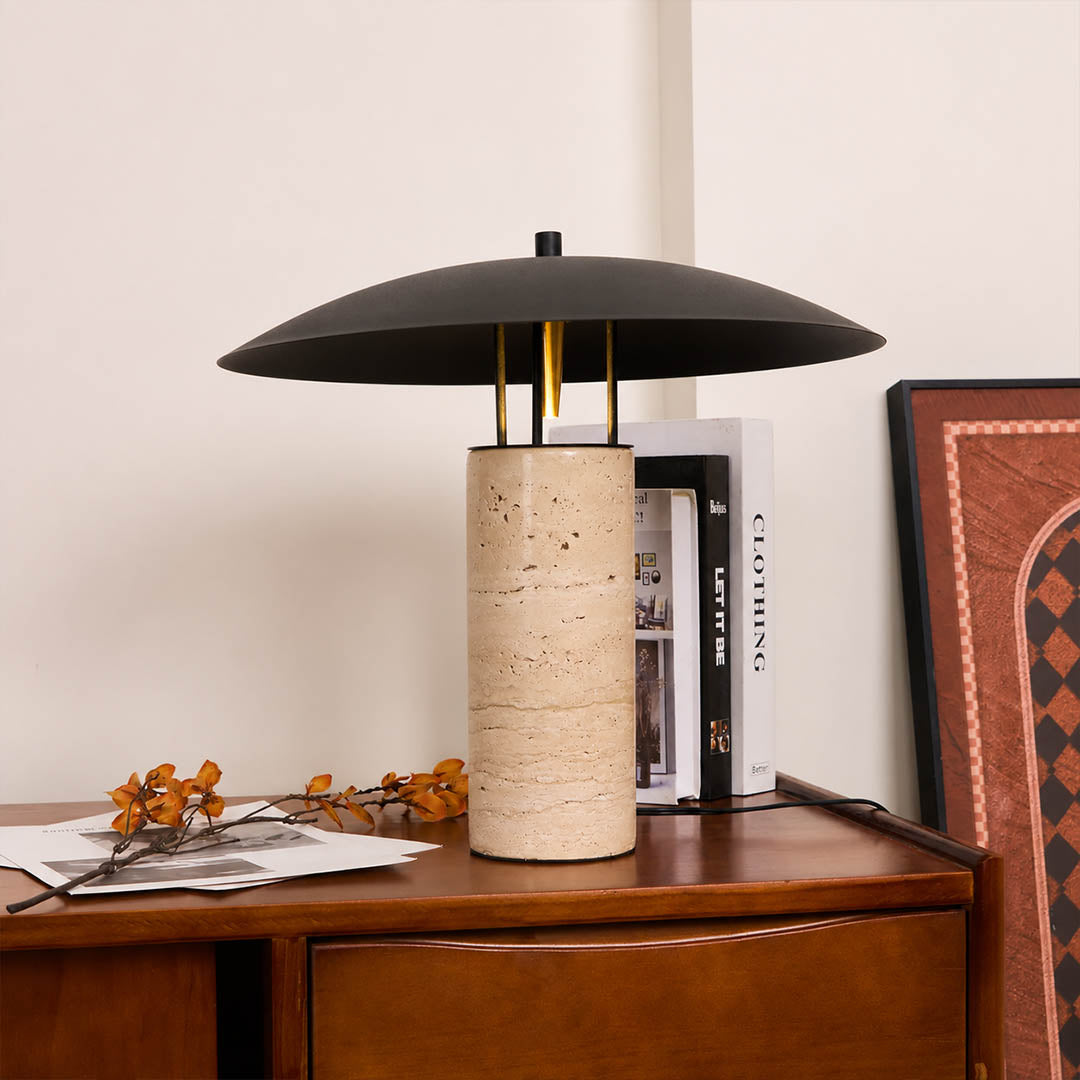 Sabbia travertine table lamp modern entryway console illuminated travertine black shade warm natural American home lifestyle interior