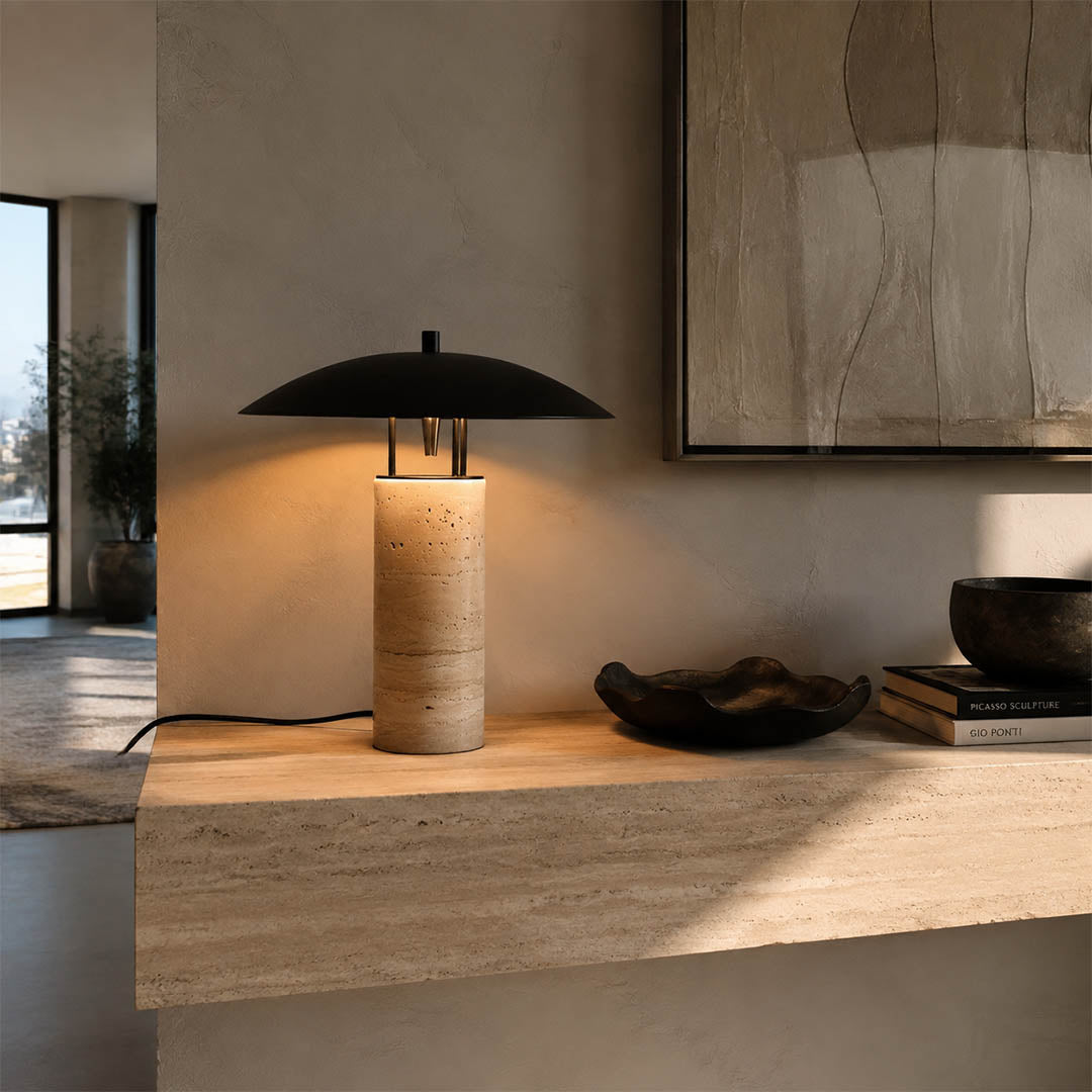 Sabbia travertine table lamp modern entryway console illuminated travertine black shade warm natural American home lifestyle interior