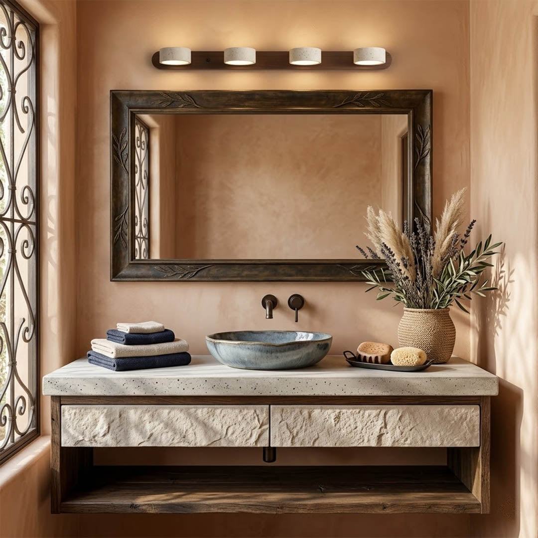 Saffron travertine vanity light above bathroom mirror warm stone glow modern interior