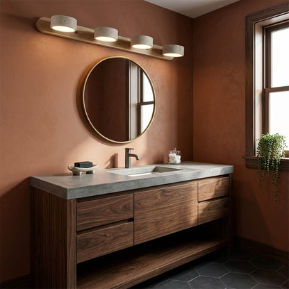 Saffron travertine vanity light above bathroom mirror warm stone glow modern interior