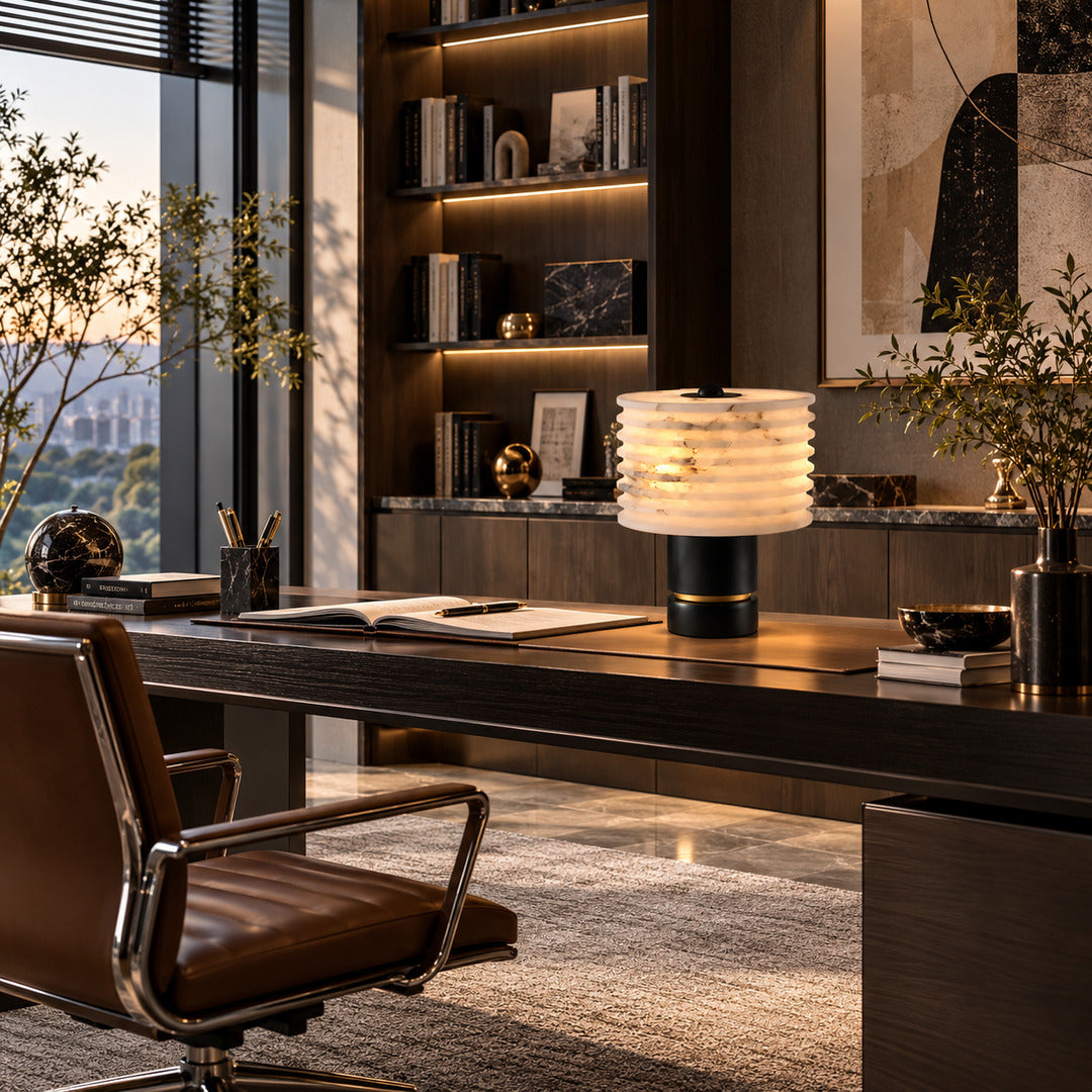 Sasso table lamp adding ambient light to a home office desk