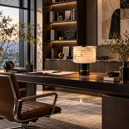 Sasso table lamp adding ambient light to a home office desk