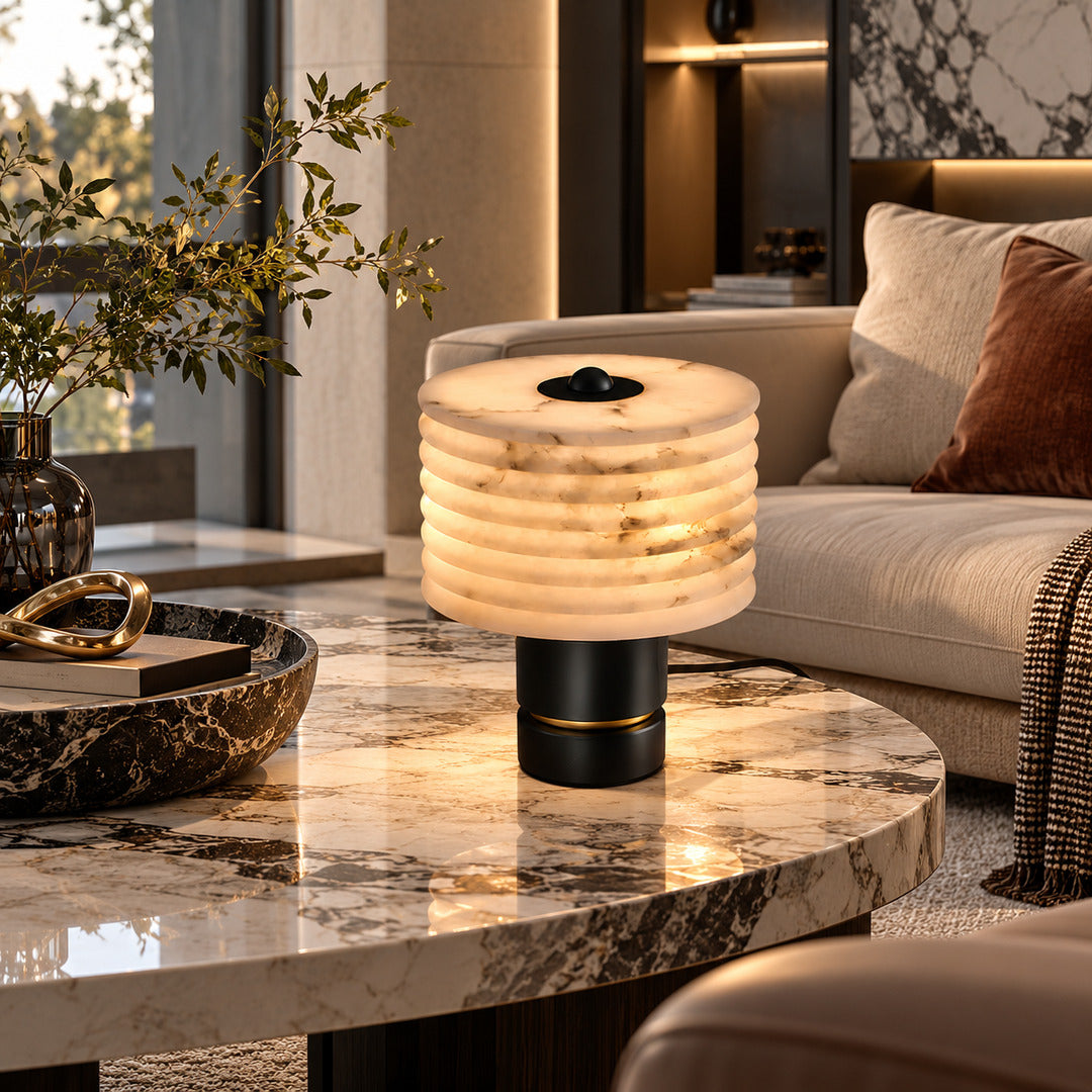 Sasso table lamp on a side table next to a living room sofa