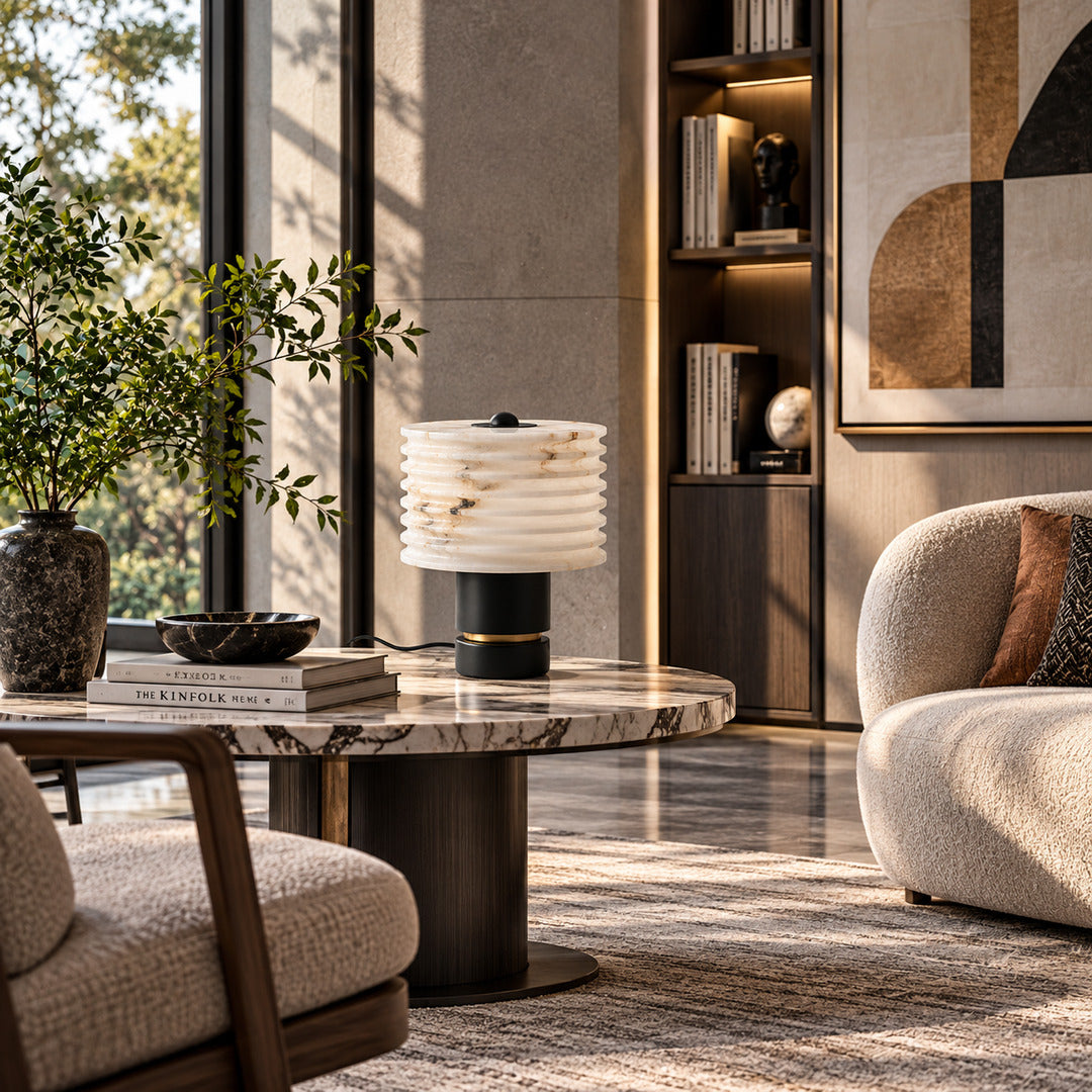 Sasso table lamp on a side table next to a living room sofa