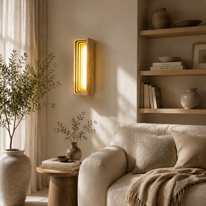 Sasso travertine wall sconce living room wall warm glow travertine stone column sculptural American home lifestyle interior styled