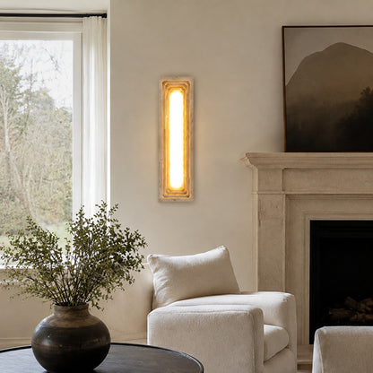Sasso travertine wall sconce living room wall warm glow travertine stone column sculptural American home lifestyle interior styled