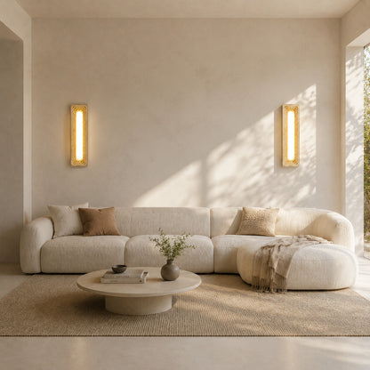 Sasso travertine wall sconce living room wall warm glow travertine stone column sculptural American home lifestyle interior styled