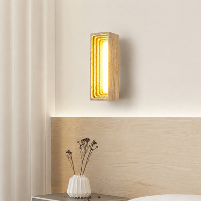 Sasso travertine wall sconce bedroom bedside warm glow natural travertine stone column minimalist American home lifestyle interior styled