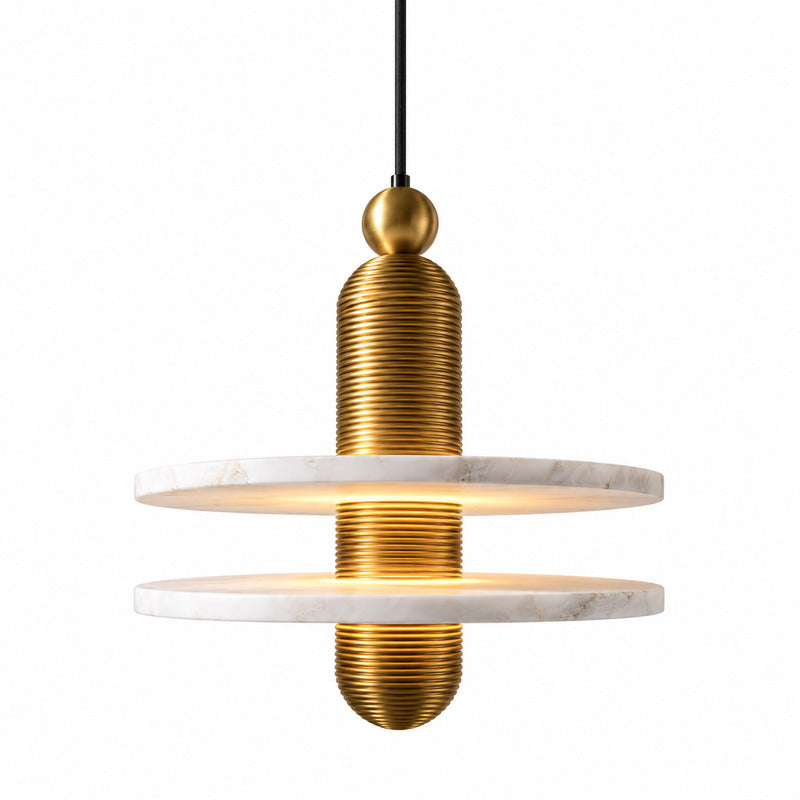 Saturno alabaster pendant light with a natural stone disc on a ribbed column glowing warm over a dining table