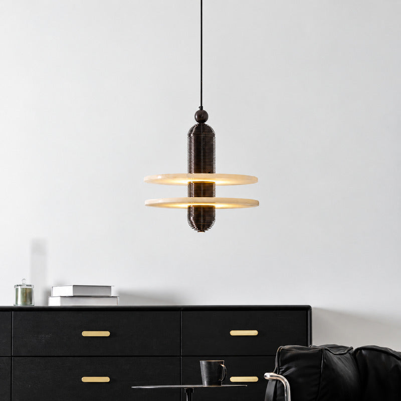 Saturno alabaster pendant as a warm sculptural accent in a modern living room