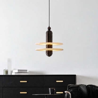 Saturno alabaster pendant as a warm sculptural accent in a modern living room