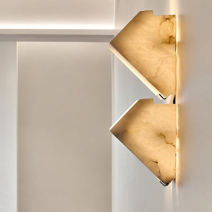 Slim side profile of the Scala alabaster wall sconce showing its low projection from the wall