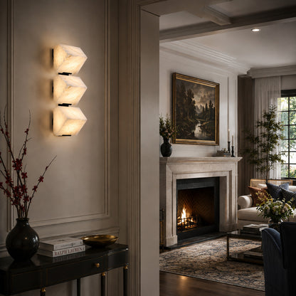 Scala alabaster wall sconce welcoming guests with a warm stepped glow in an entryway