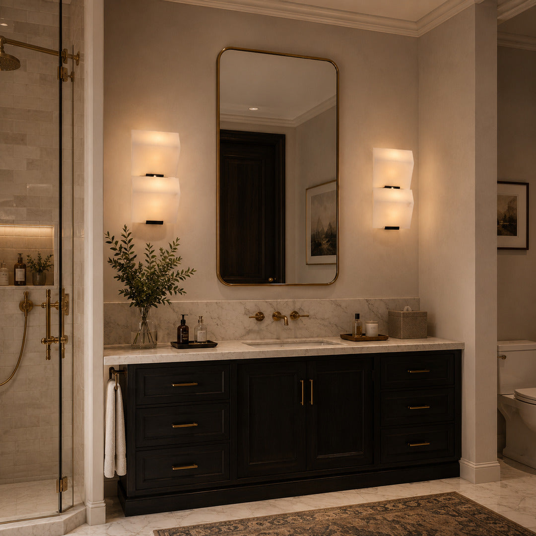 Row of Scala alabaster wall sconces lining a luxury hotel corridor with a warm stepped glow