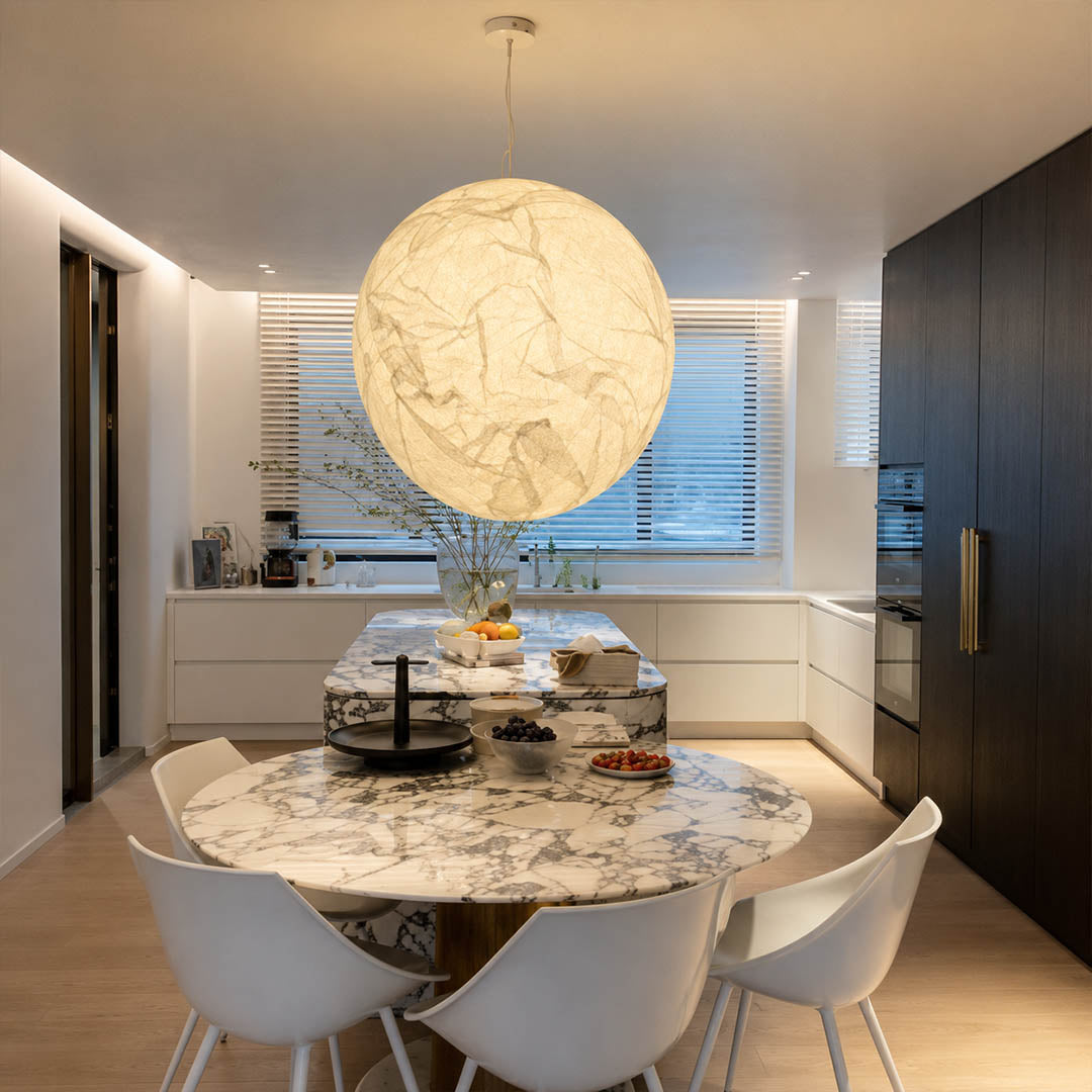 Selene medium silk moon pendant light Wabi Sabi dining room natural wood ceramic serene minimalist warm ambient glow lifestyle interior