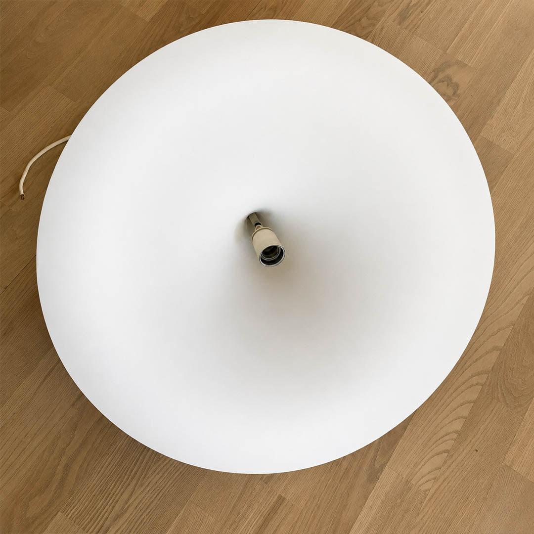 Semi pendant light E26 E27 standard socket bulb inside cone shade warm ambient light emission detail close up practical hardware