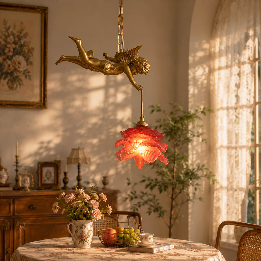Serafino pendant light brass and white angel pair over round dining table French country dining room warm glare-free glow American home lifestyle interior
