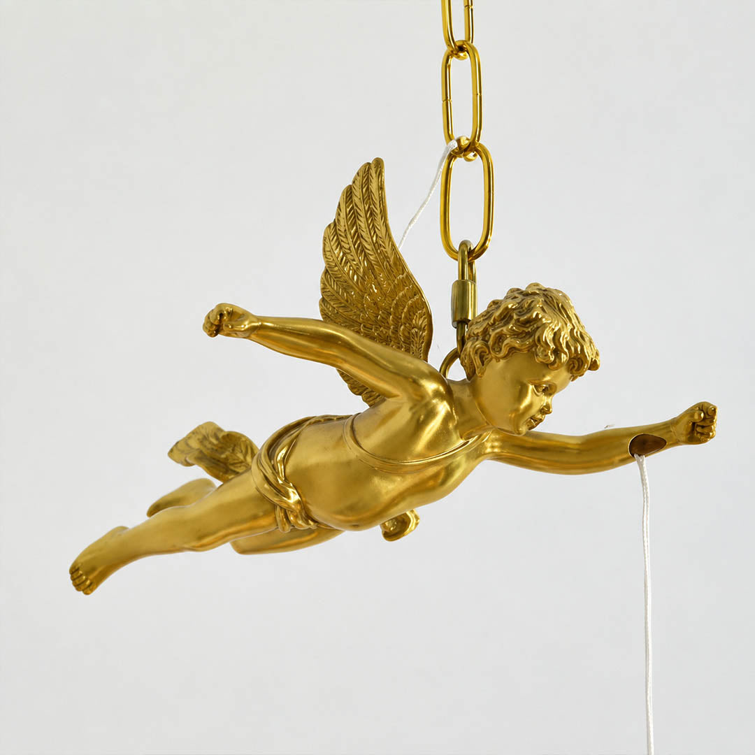 Serafino cascade pendant brass finish flying cherub angel sculpted figure vintage baroque detail close up craftsmanship