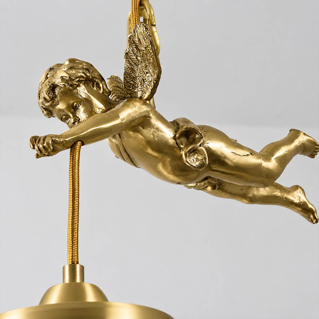 Serafino cascade pendant brass finish flying cherub angel sculpted figure vintage baroque detail close up craftsmanship