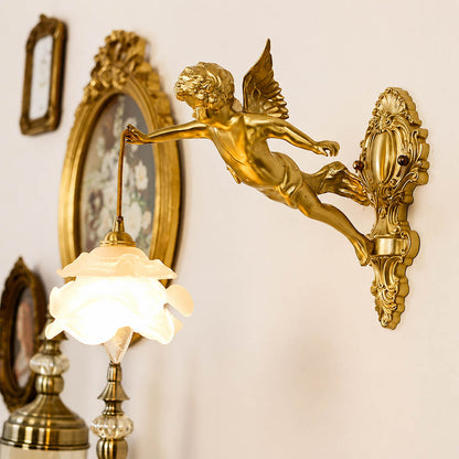 Serafino wall sconce brass finish angel pair flanking arched vanity mirror powder room symmetrical warm feminine American home lifestyle interior