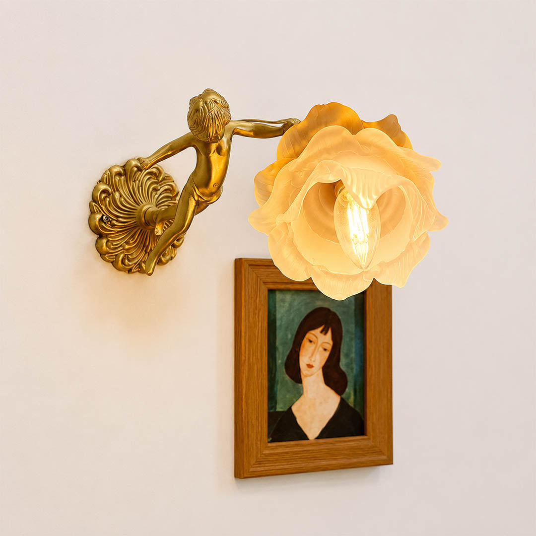 Serafino wall sconce brass finish angel living room feature wall beside framed portrait vintage baroque warm American home lifestyle interior