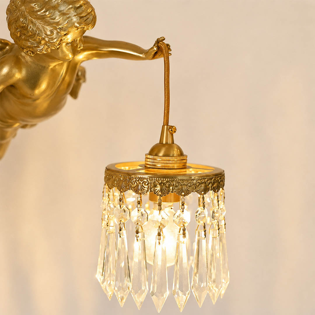 Serafino wall sconce brass finish angel cherub figure holding glass flower shade sculpted detail close up craftsmanship