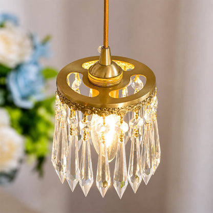 Serafino wall sconce illuminated soft warm glow through glass flower rose shade brass angel evening cozy romantic detail close up mood