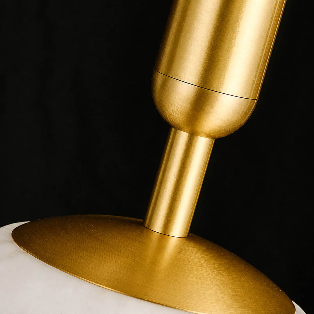 Sfera alabaster globe pendant light brushed brass stem mounting plate hardware detail close up refined luxurious