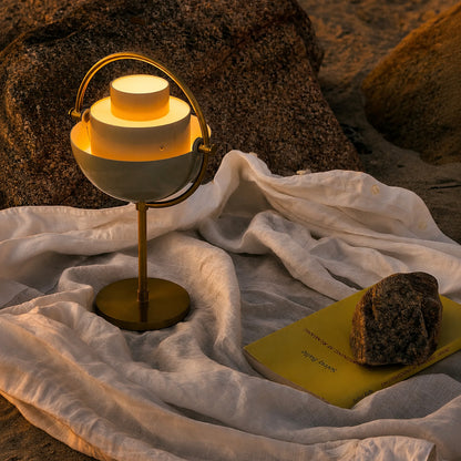 Sfera sculptural table lamp shade tilted up uplight ambient glow metal sculptural American home lifestyle interior styled