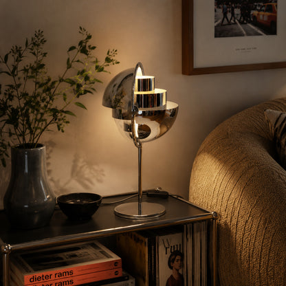 Sfera sculptural table lamp illuminated evening glowing metal ball sculptural artful cozy American home lifestyle interior