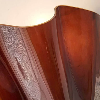 Shellie tinted glass shell curve close up light refraction tide pool effect amber glow water like illumination detail