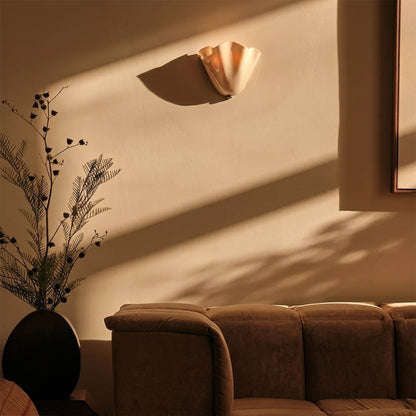 Shellie beige wall sconce powder room bathroom vanity mirror modern coastal interior soft glow