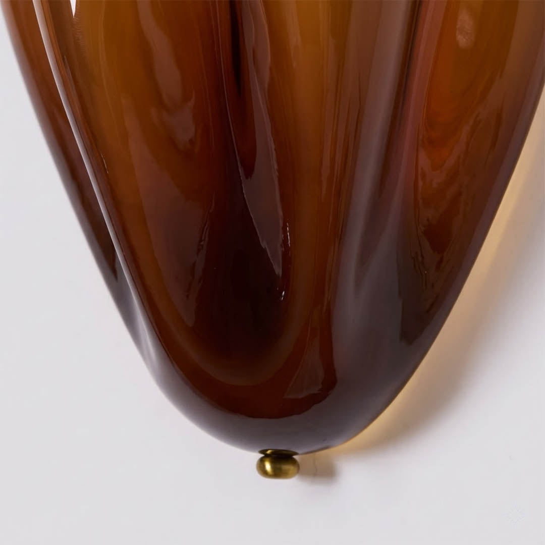 Shellie tinted glass shell curve close up light refraction tide pool effect amber glow water like illumination detail