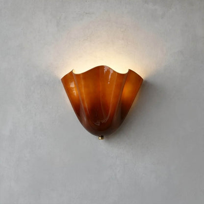 Shellie coastal wall sconce amber tinted glass shell curve shape Stuberlighting white background product photography