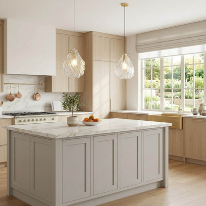Shellie clear coastal pendant pair above kitchen island breakfast bar crystalline glass brass coastal modern interior