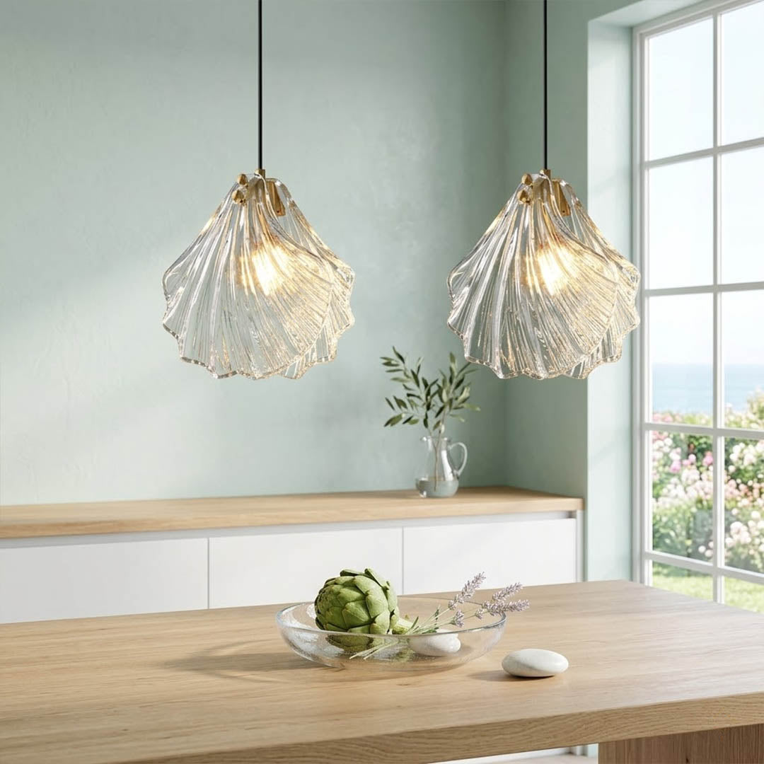 Shellie clear coastal pendant pair above kitchen island breakfast bar crystalline glass brass coastal modern interior