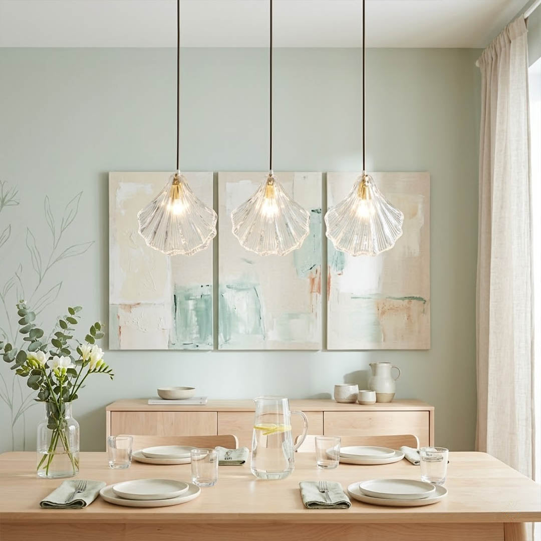 Shellie clear coastal pendant pair above kitchen island breakfast bar crystalline glass brass coastal modern interior
