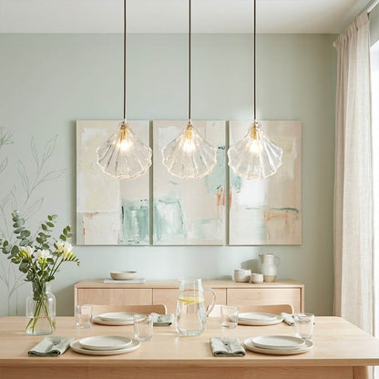 Shellie clear coastal pendant pair above kitchen island breakfast bar crystalline glass brass coastal modern interior