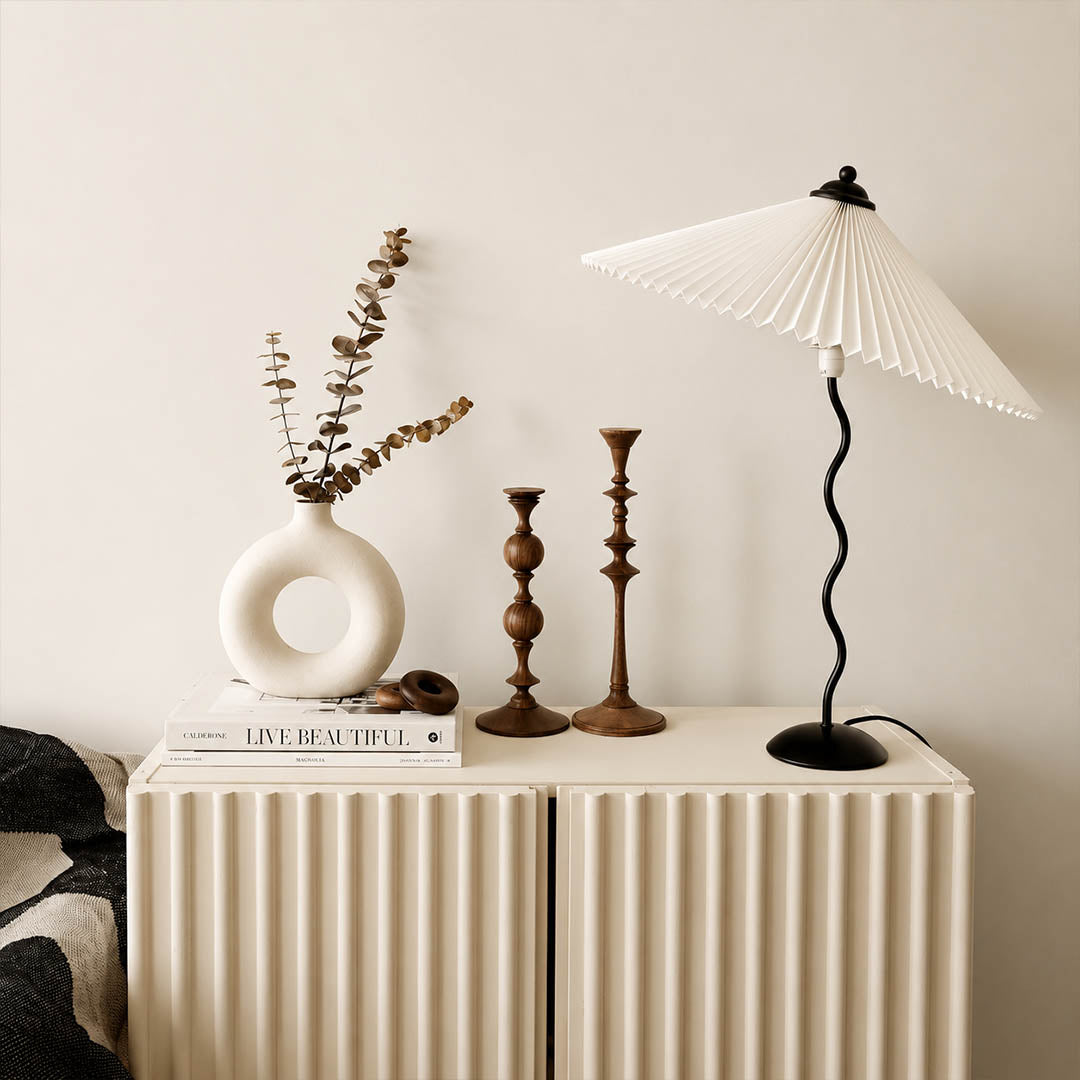 Sinuo table lamp black beige modern primary bedroom bedside nightstands pair sculptural squiggle wavy metal fabric drum shade postmodern Memphis inspired warm ambient intimate lifestyle interior