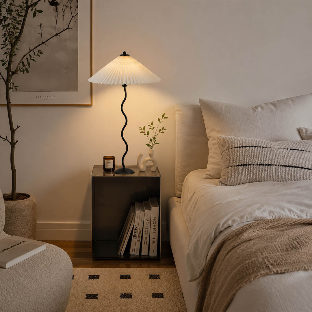 Sinuo table lamp black beige modern primary bedroom bedside nightstands pair sculptural squiggle wavy metal fabric drum shade postmodern Memphis inspired warm ambient intimate lifestyle interior