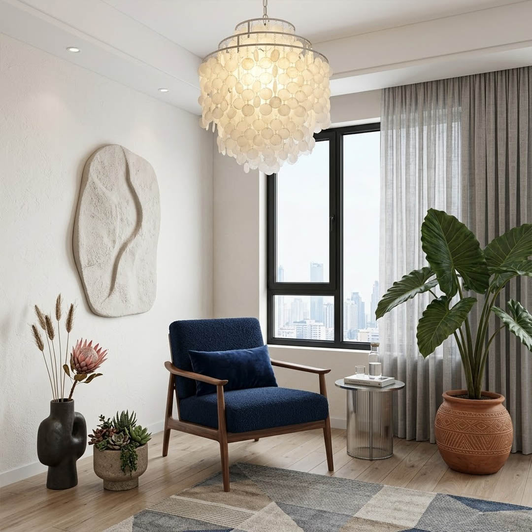 Sirena Gold FUN style shell disc pendant coastal living room beach house Hampton white wood natural shells warm glow lifestyle interior