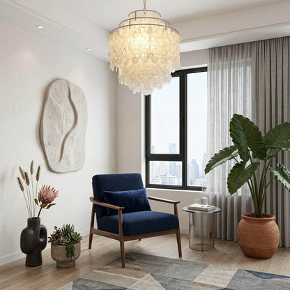 Sirena Gold FUN style shell disc pendant coastal living room beach house Hampton white wood natural shells warm glow lifestyle interior